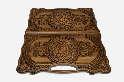 Angled view of the luxury Armenian backgammon set showing both carved ornaments