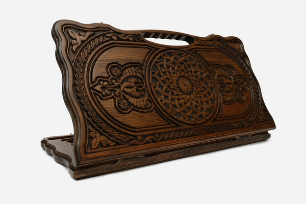 Carved Armenian backgammon board with a flower ornament and an interlaced ornament, cut-out carry handle, propped open