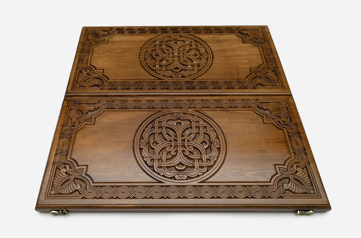 Delicate Armenian ornament hand-carved in light honey-toned wood - backgammon board