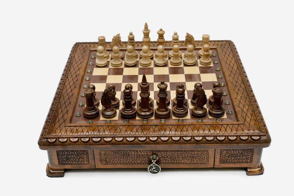 Carved chess set empty board, top-down view of the walnut and maple squares
