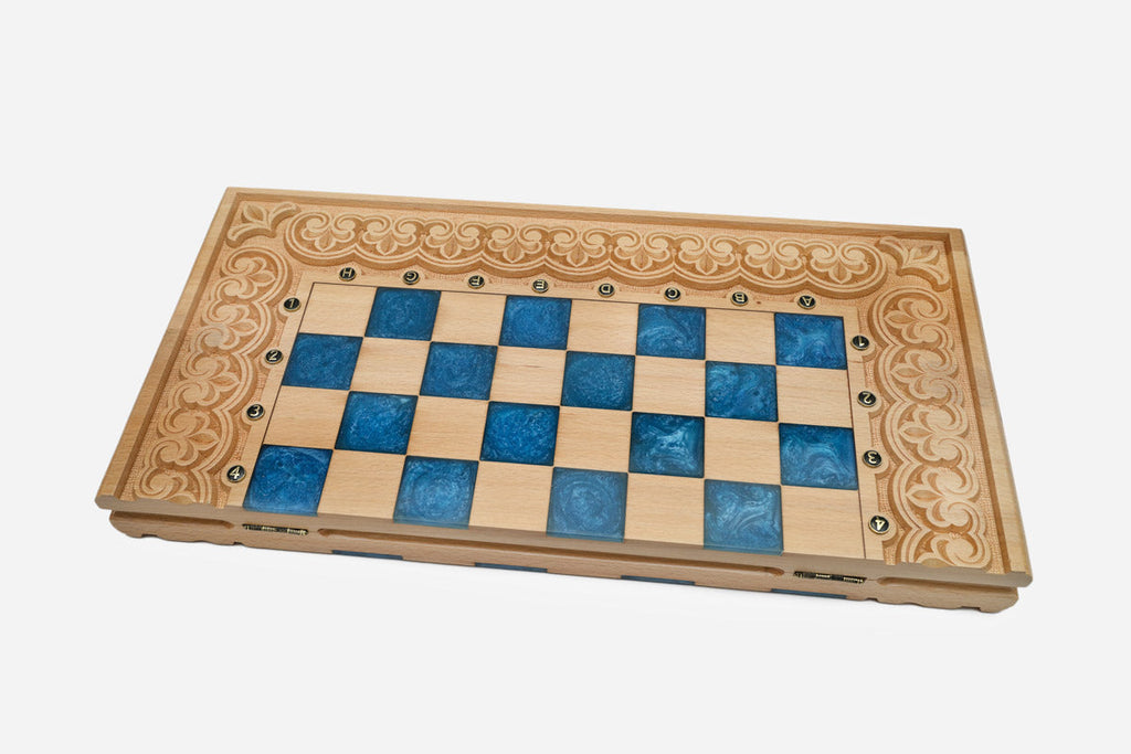 The large blue epoxy chess set shown from an angle