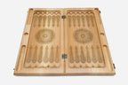 Detail of the carved fleur-de-lis border and blue epoxy squares