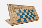 Overhead view of the blue epoxy board and full set of pieces