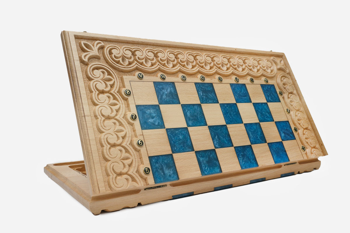 Overhead view of the blue epoxy board and full set of pieces