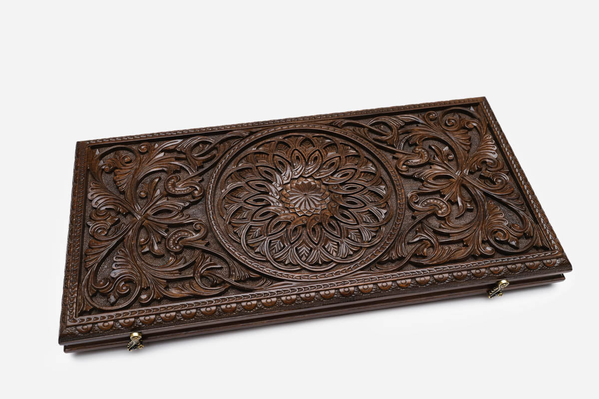 Interior view of the opened board with its carved backgammon points