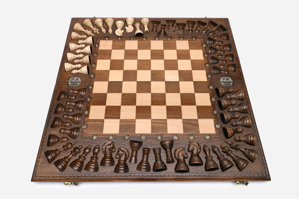 Close-up of the bronze and wood pieces on the maple and walnut squares