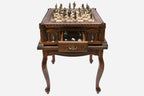 Castle tower game table with chess pieces set up and the drawer open