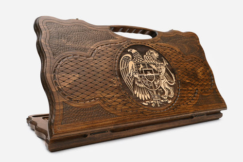 Carved Armenian backgammon board with the coat of arms of Armenia in bronze and a cut-out carry handle, propped open