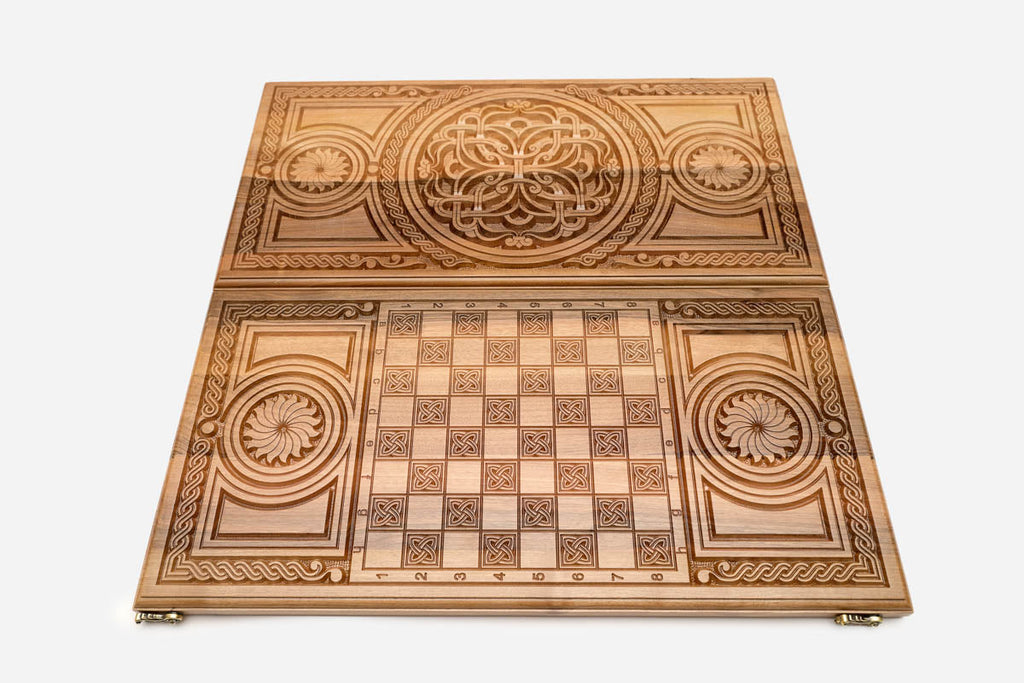Bold central ornament with running borders hand-carved in walnut - backgammon board