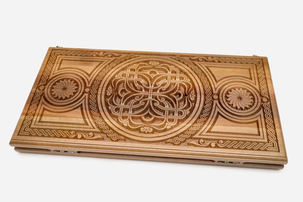 Floral ornament backgammon set with 32 beech and walnut checkers, dice and carrying bag