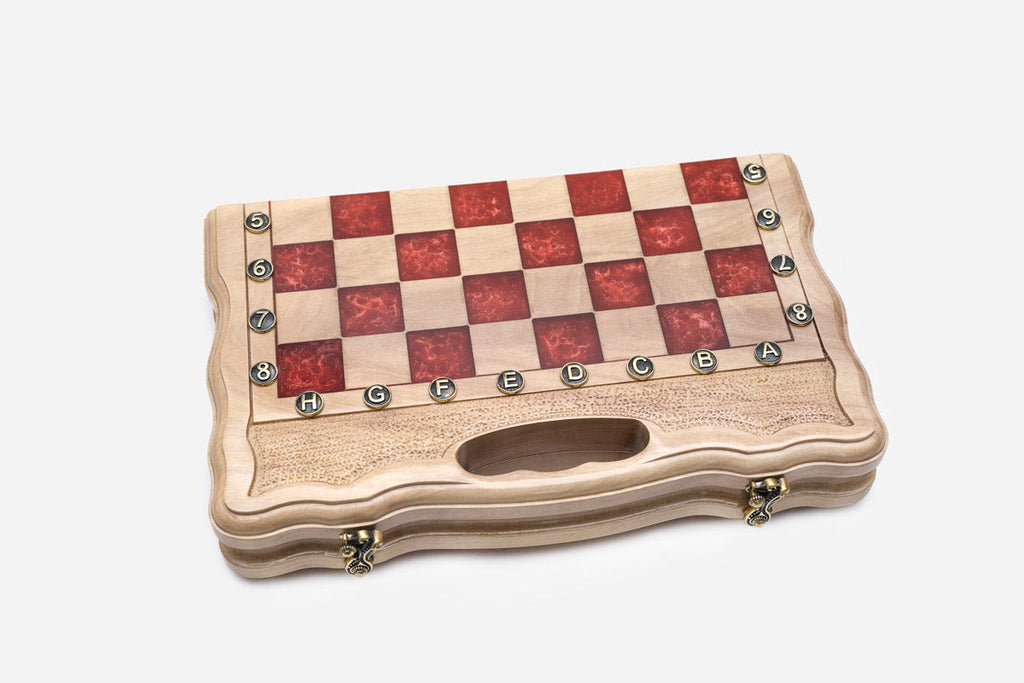 Detail of the red epoxy squares, brass markers and carry-handle cutout