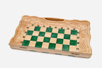 The grape-vine green epoxy chess set shown from an angle