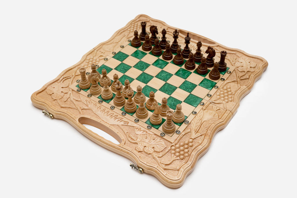 Angled view of the grape-vine green epoxy chess set