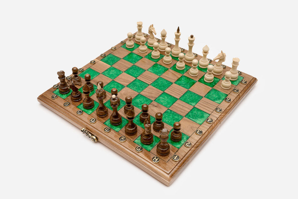 The folding board shown from the side with its brass clasp