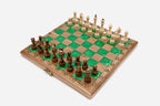 The folding board shown from the side with its brass clasp
