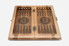 Overhead view of the green epoxy board with the full set of wooden pieces