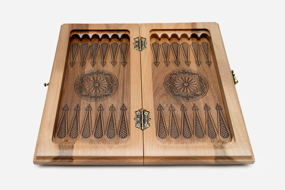 Overhead view of the green epoxy board with the full set of wooden pieces