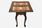 Close-up of the crowned Georgian coat of arms on the backgammon table lid