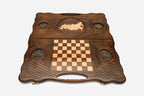 Angled view of the luxury Russian backgammon set showing the carved map and bronze details