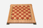 The red epoxy chess set shown from a low angle