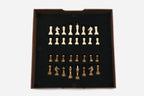 Detail of the brass coordinate markers around the red epoxy board