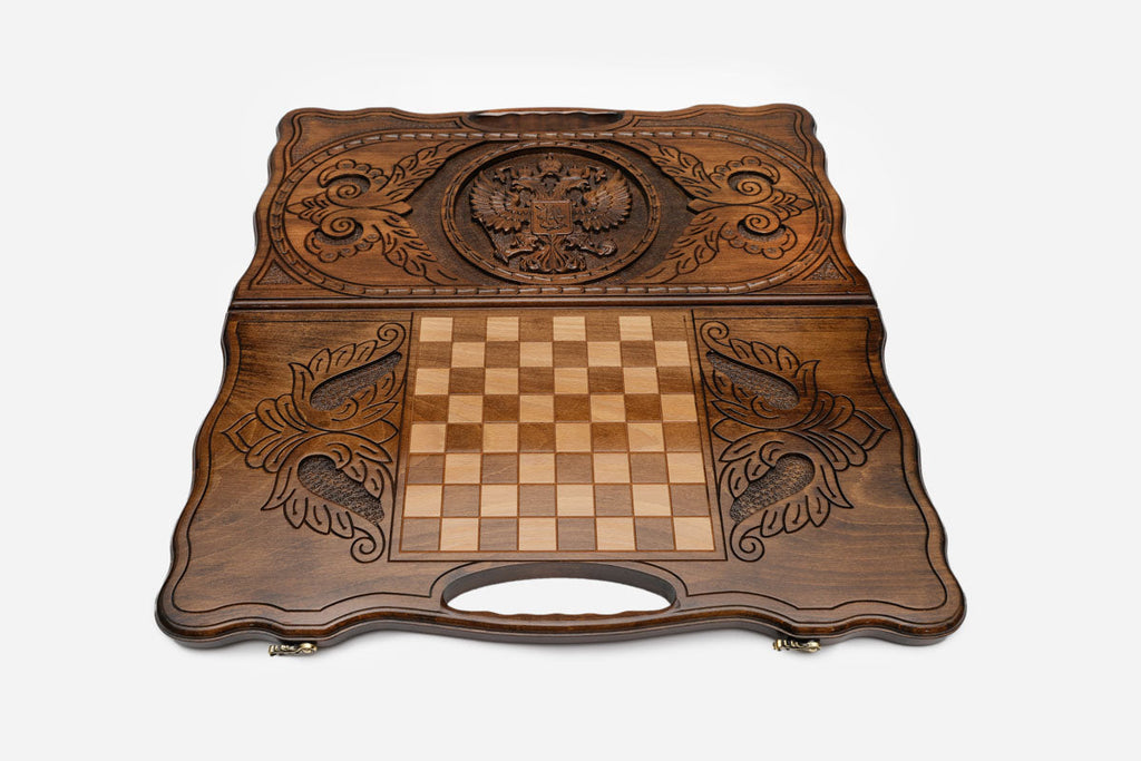 Angled view of the handmade Russian backgammon set showing the carved lid