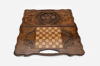 Angled view of the handmade Russian backgammon set showing the carved lid