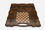 Angled view of the handmade Armenian backgammon set showing both carvings on the lid