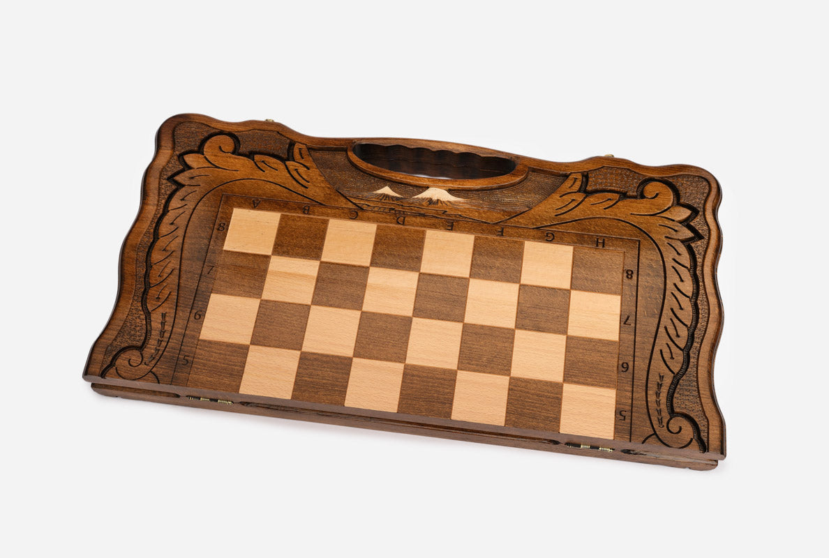 Close-up of the inlaid twin-peaked Mount Ararat above the built-in carry handle