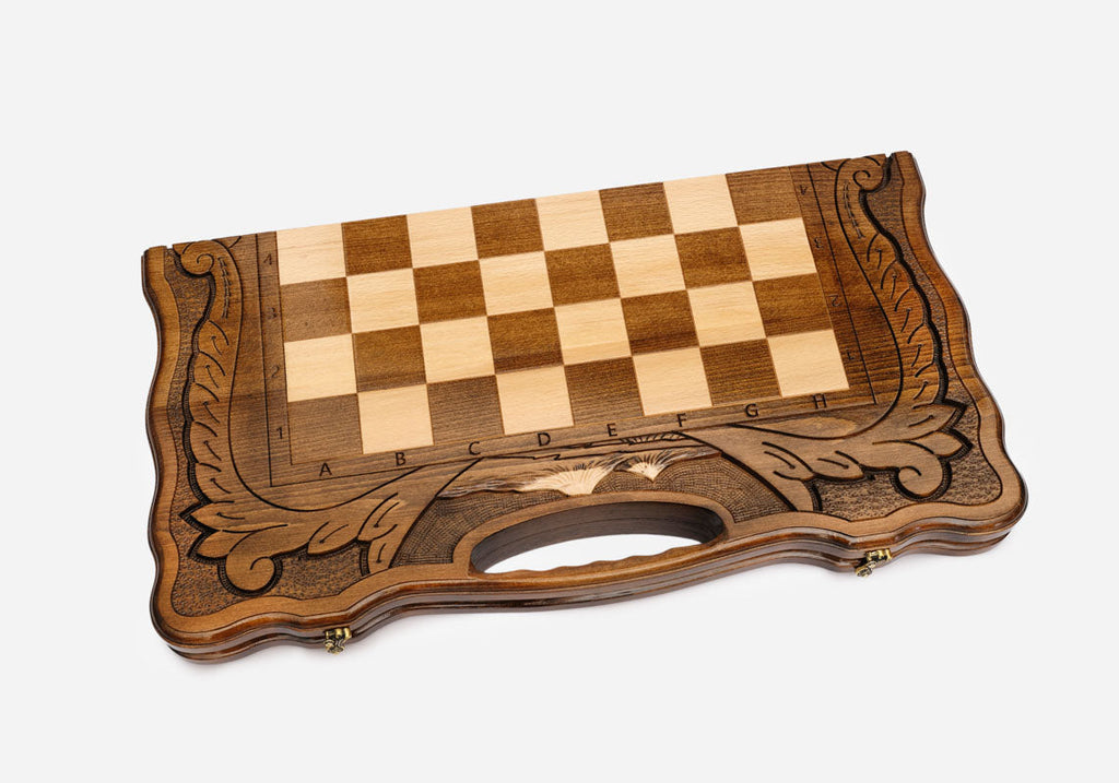 Detail of the turned chess pieces on the maple and walnut inlaid squares