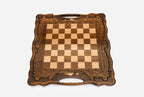 Overhead view of the full set of 32 wooden pieces in starting position