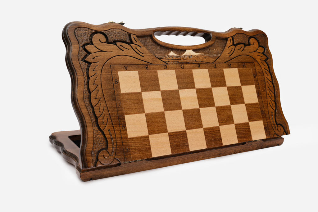 Top-down view of the opened board showing the playing field and carved borders