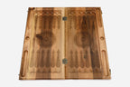 The blue epoxy tree spreading across the closed walnut lid
