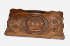 Angled view of the royal crown carved backgammon board