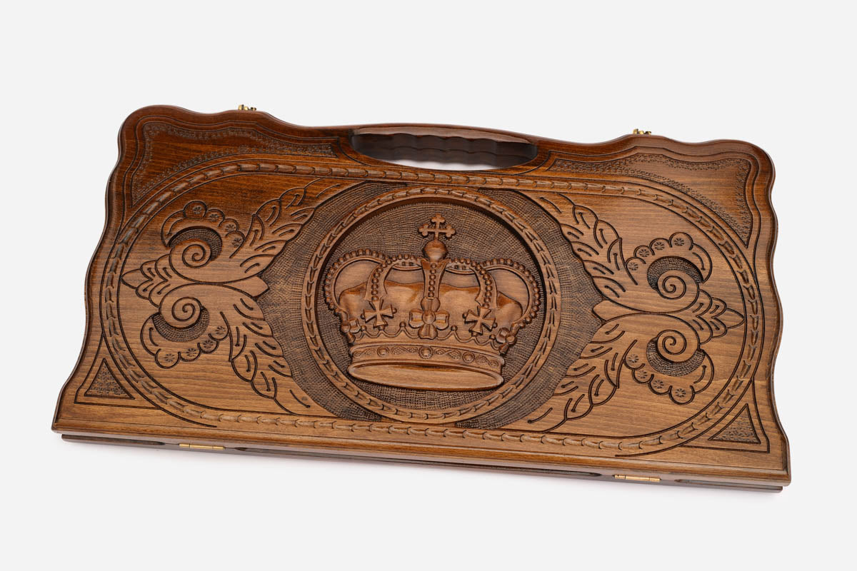 Angled view of the royal crown carved backgammon board