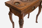 Lion backgammon table closed, front view showing the carved lion head on the lid