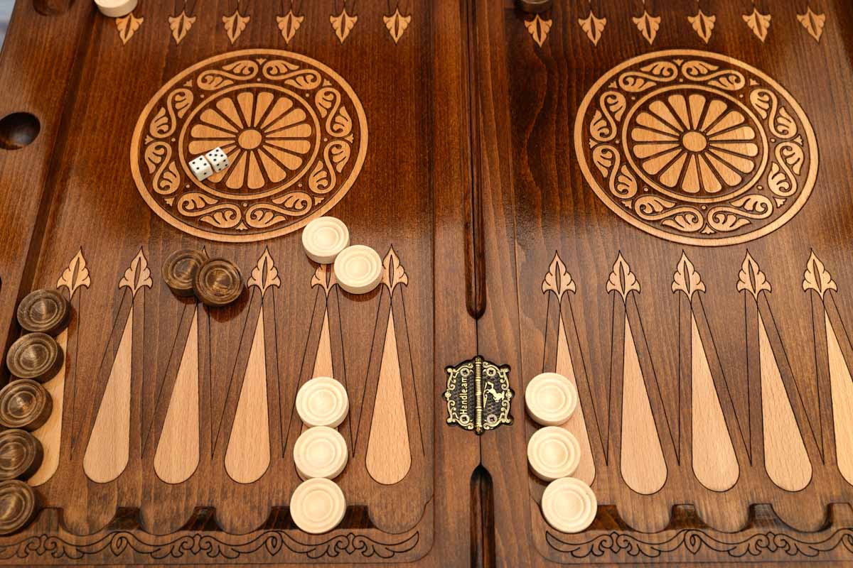Lion backgammon table closed, angled view of the lid and carved legs