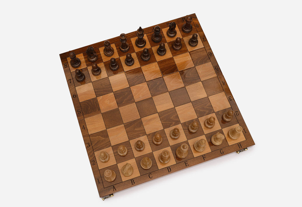 Handmade wooden chess set with bronze clasps