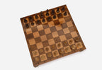 Handmade wooden chess set with bronze clasps