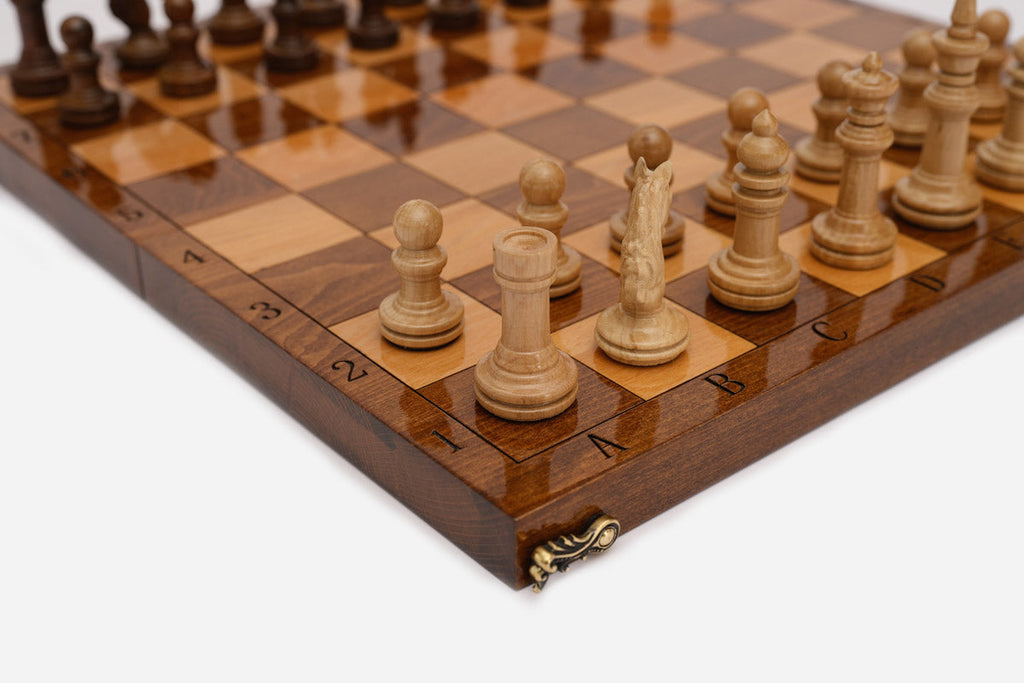 Close-up of the classic carved border on the board