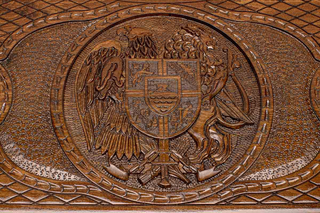 Detail of the cross-hatched carved ground