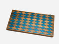 Walnut backgammon board with alternating blue epoxy and walnut diamonds across the closed lid