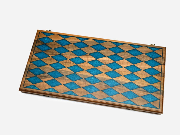 Walnut backgammon board with alternating blue epoxy and walnut diamonds across the closed lid
