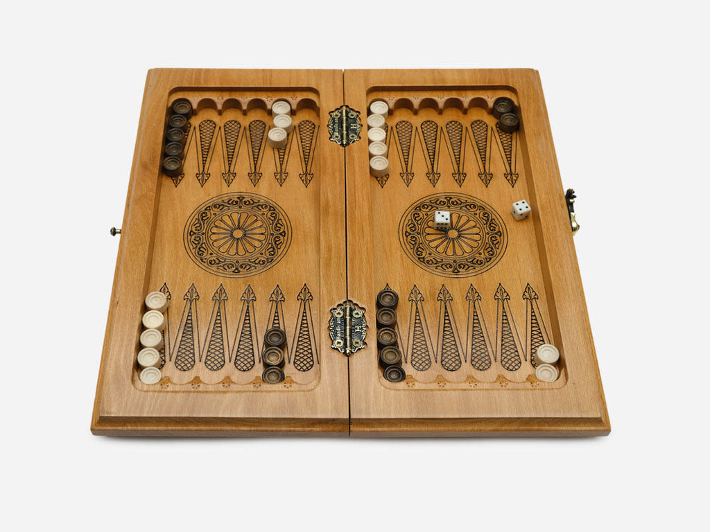 Angled view of the brown epoxy chess board with its figural wooden pieces in position