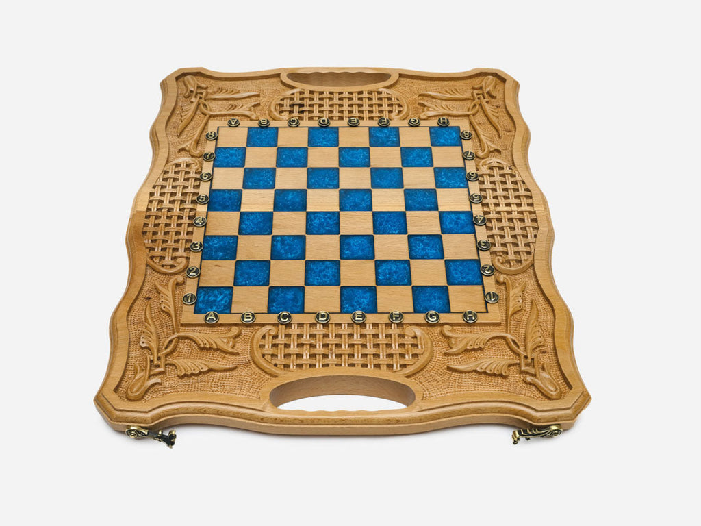 The blue epoxy chess set shown closed and ready to carry
