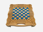 The blue epoxy chess set shown closed and ready to carry