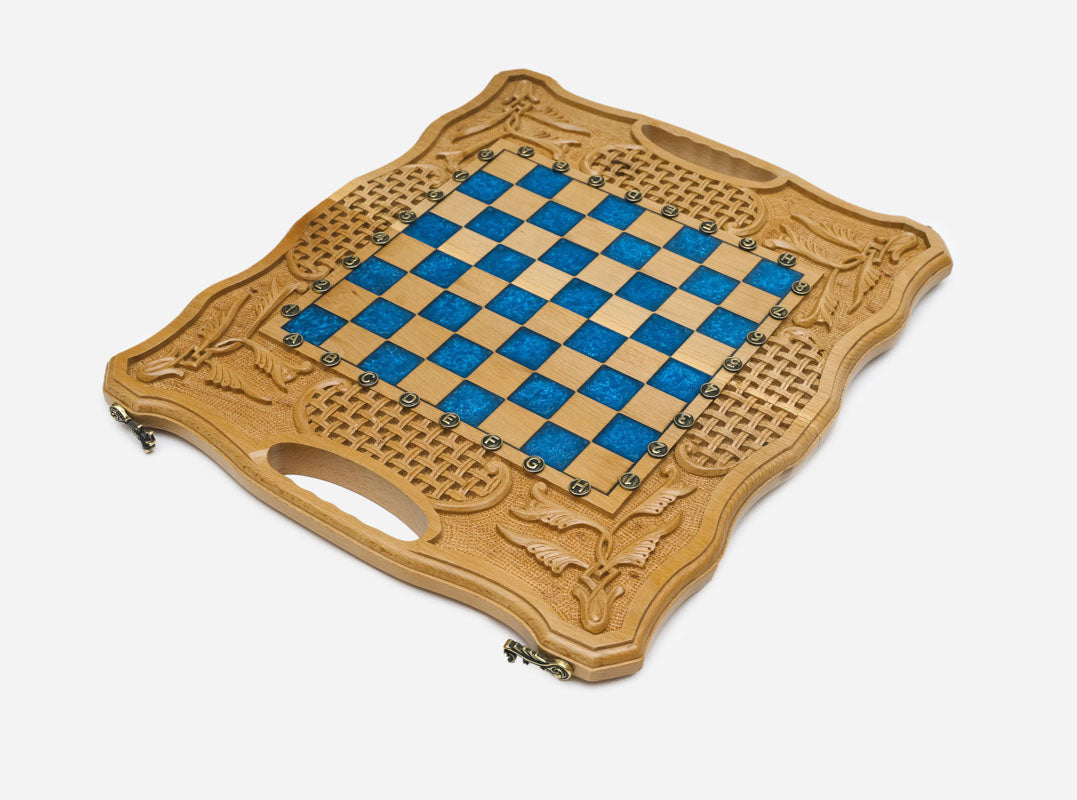 The folding board partly closed, showing the carved case