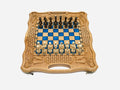 Luxury blue epoxy chess set with royal-blue squares, carved borders and turned wooden pieces set up for play