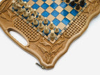 Close-up of the blue epoxy squares, carved wheat and woven border and cut-out carry grip