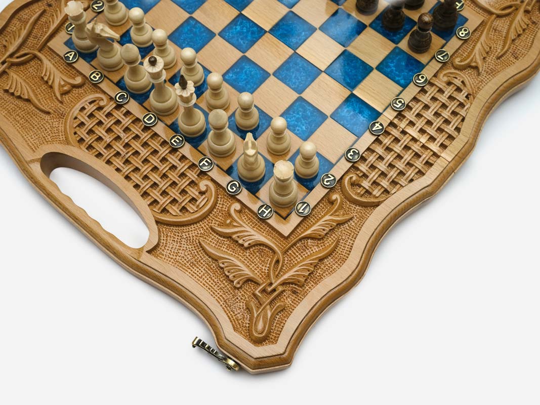 Close-up of the blue epoxy squares, carved wheat and woven border and cut-out carry grip
